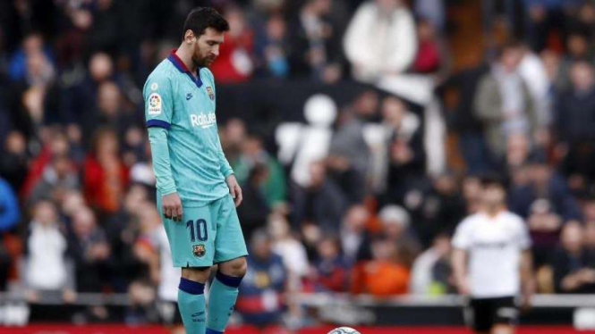 Ekspresi kecewa Lionel Messi usai Barcelona kalah dari Valencia