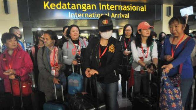 Ilustrasi Sejumlah wisatawan asal China tiba Indonesia.