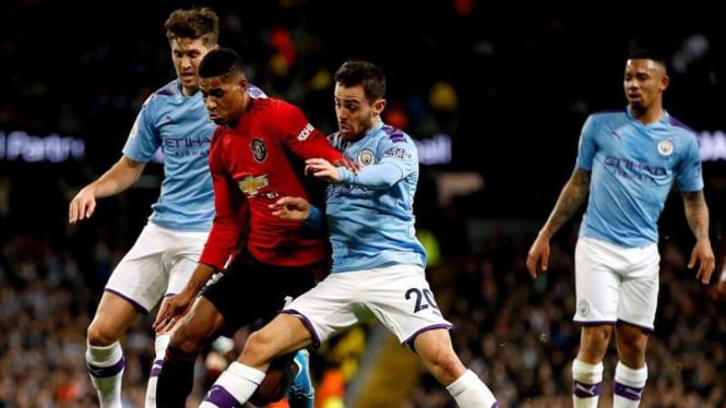 Laga semifinal Piala Liga Inggris antara Manchester City vs Manchester United