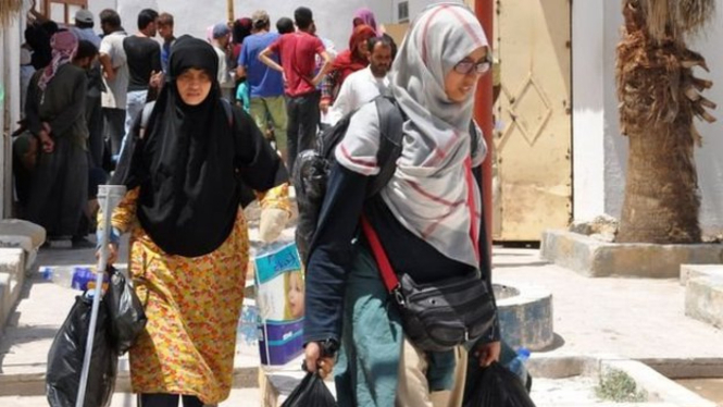 Sebanyak 17 warga negara Indonesia yang semula berada di kamp pengungsi Ain Issa, sekitar 60km dari Kota Raqqa, Suriah, telah dideportasi ke Indonesia pada 2017 lalu. - AFP