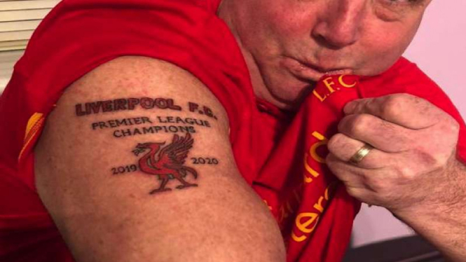 Fans Liverpool buat tato juara