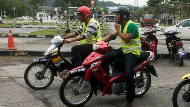 Pengendara ojek online di Malaysia