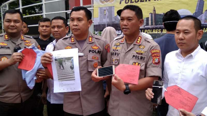 Kapolres Metro Jakarta Pusat Kombes Polisi Heru Novianto merilis kasus hoax.