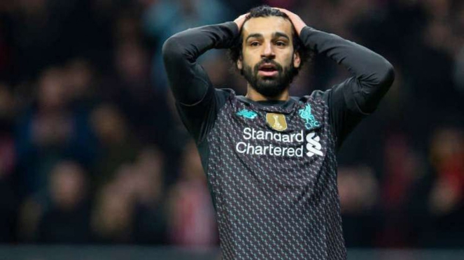 Ekspresi kecewa bintang Liverpool. Mohamed Salah, usai kalah dari Atletico Madri