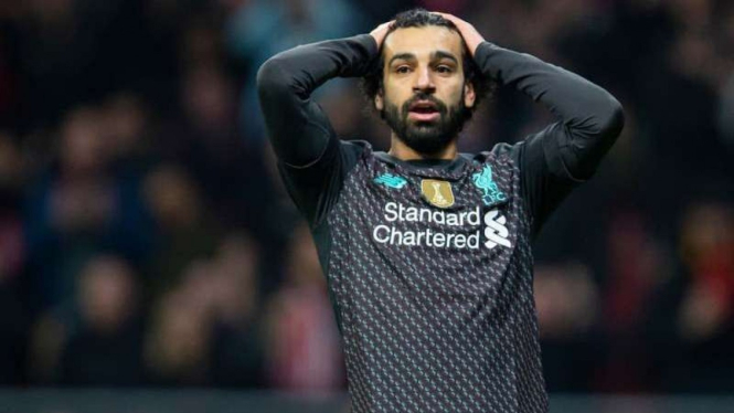 Ekspresi kecewa bintang Liverpool. Mohamed Salah, usai kalah dari Atletico Madri