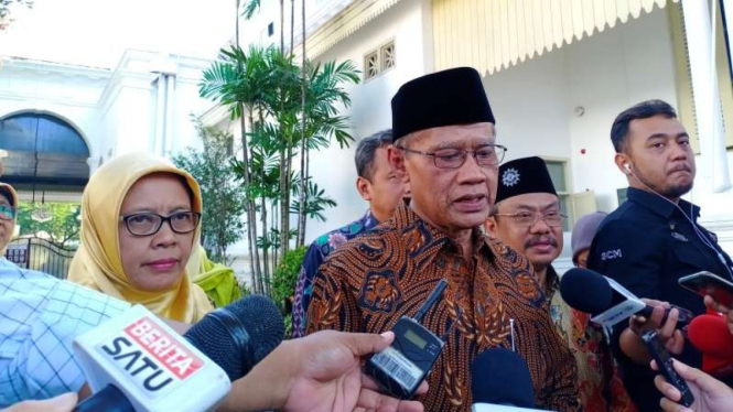 Ketua Umum Muhammadiyah, Haedar Nashir, usai bertemu Jokowi di Istana Merdeka.