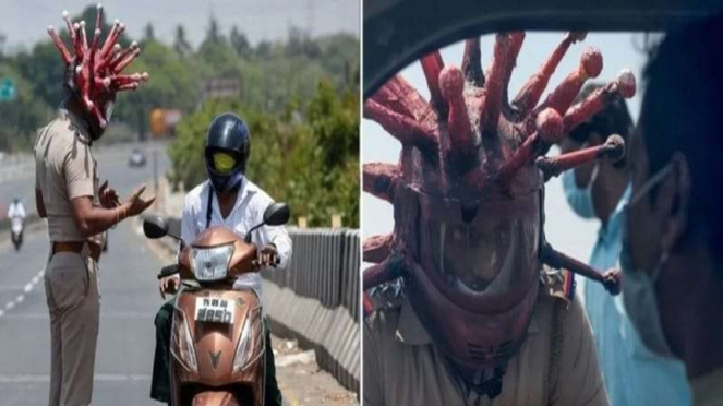 Polisi di India pakai helm Virus Corona untuk menakut-nakuti warga.