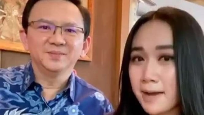 Mantan Gubernur DKI Jakarta, Basuki Tjahaja Purnama dan istri.