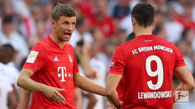 Pemain Bayern Munich, Thomas Mueller dan Robert Lewandowski.