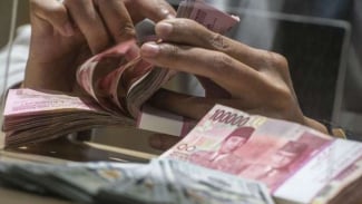 Rupiah Pagi Ini Melemah di Level Rp14.867 per Dolar AS