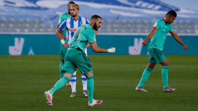 Bomber Real Madrid, Karim Benzema, merayakan gol
