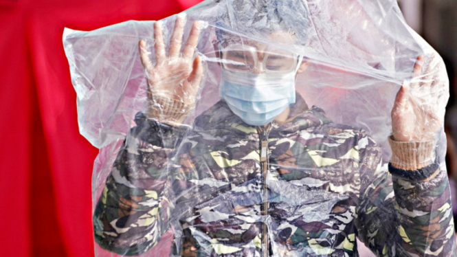 Gak Punya Hati! Pengusaha China Jual Masker Palsu di Tengah Pandemi, Nasibnya Kini Dijeruji Besi!. (FOTO: Reuters/Aly Song)