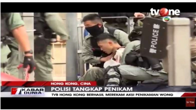 Penikaman terhadap periwa polisi Hong Kong oleh pengujuk rasa.