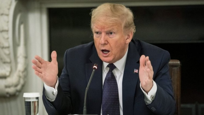 Presiden Amerika Serikat Donald Trump menuduh WHO berada di bawah kendali pemerintah China.-Getty Images



