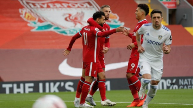 Winger Liverpool, Mohamed Salah, merayakan gol ke gawang Leeds United