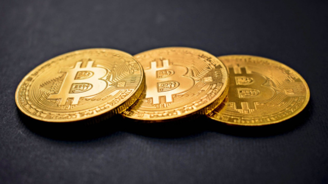 Ilustrasi Bitcoin. (FOTO: Unsplash/Dmitry Demidko)