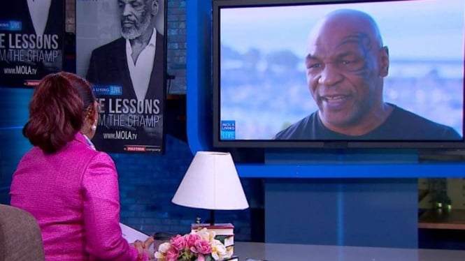 Mike Tyson bincang-bincang dengan Susi Pudjiastuti