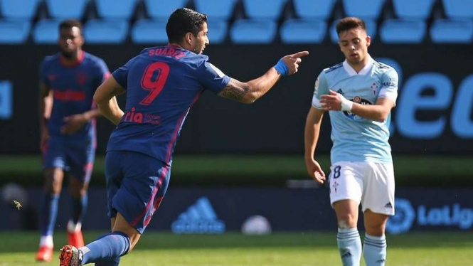 Penyerang Atletico Madrid, Luis Suarez bobol gawang Celta Vigo