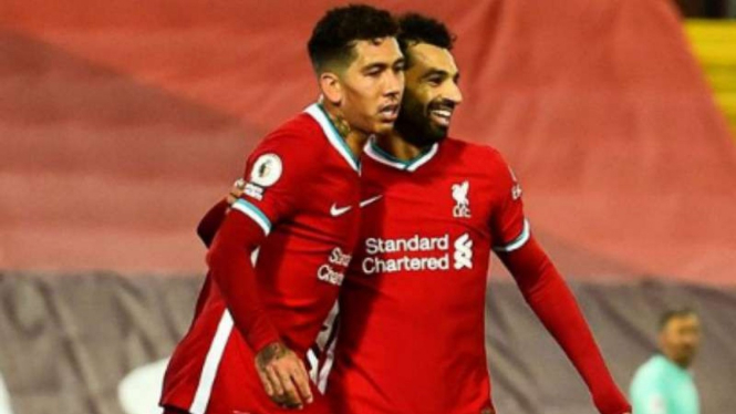 Pemain Liverpool, Roberto Firmino dan Mohamed Salah.