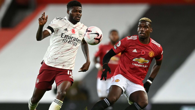 Duel gelandang Arsenal, Thomas Partey dan gelandang MU, Paul Pogba