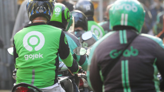 Ojol Diajak Populerkan Tas Belanja Guna Ulang
