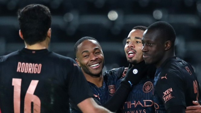 Pemain Manchester City merayakan gol ke gawang Swansea City