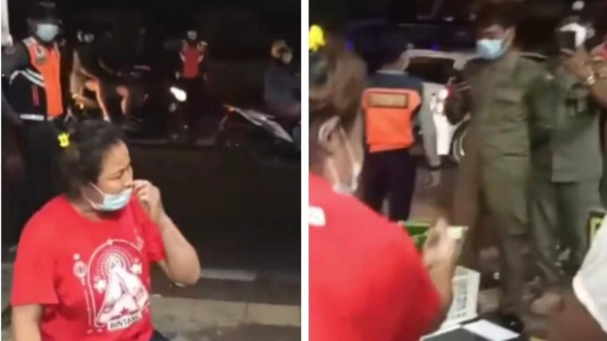 Seorang Ibu Berbaju Merah Berdebat dengan Petugas Mengenai Penerapan Jam Malam (Instagram/@restuanantaaa)