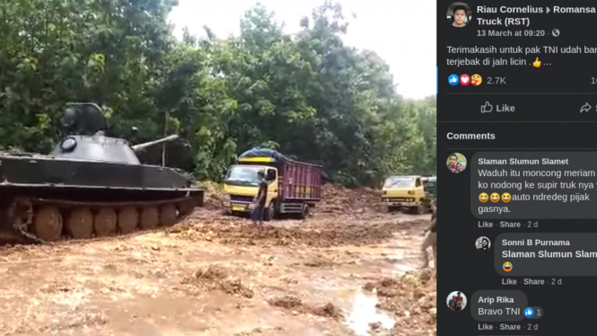 Tank evakuasi truk yang terjebak di jalan lumpur