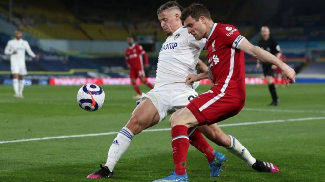 James Milner dalam pertandingan Liverpool melawan Leeds United