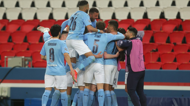 Pemain Manchester City merayakan gol