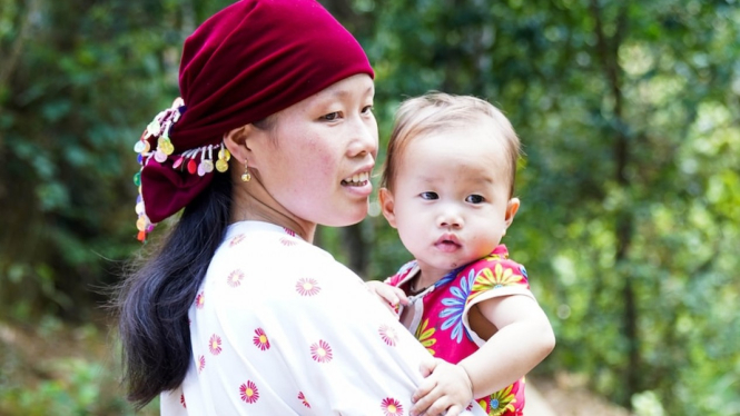Mai, warga Vietnam yang kawin saat usianya masih 17, kini sedang mengandung anak ketiga. (Supplied: Plan International)