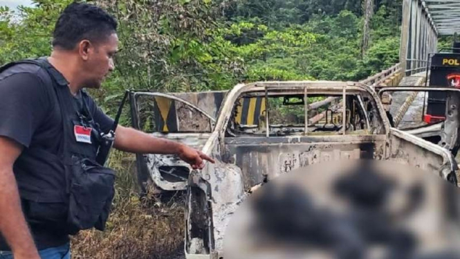 Jasad dua karyawan yang dibunuh dan dibakar beserta kendaraannya di pinggir kalo Brazza, Dekai, Yahukimo, Papua, oleh KKB pimpinan Tenius Gwijangge, Minggu, 22 Agustus 2021.