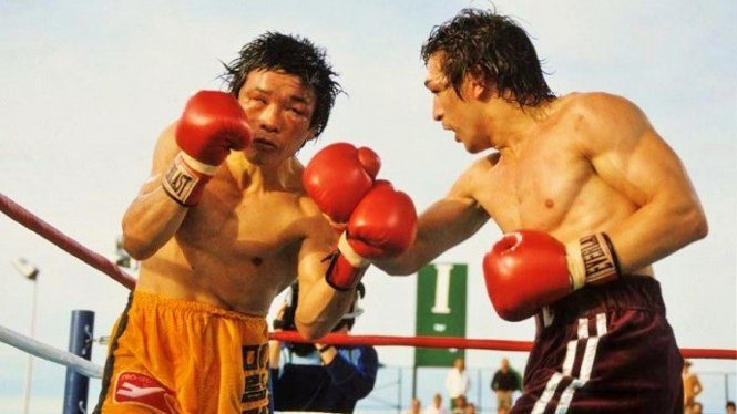 Duel tinju Ray Mancini vs. Duk Koo Kim 