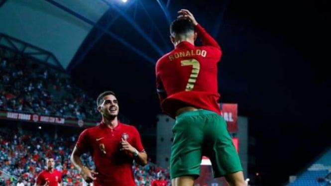 Kapten Timnas Portugal, Cristiano Ronaldo rayakan gol.