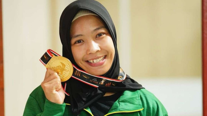 Shintia Eka atlet pegulat berhijab Peraih Medali Emas di PON XX Papua