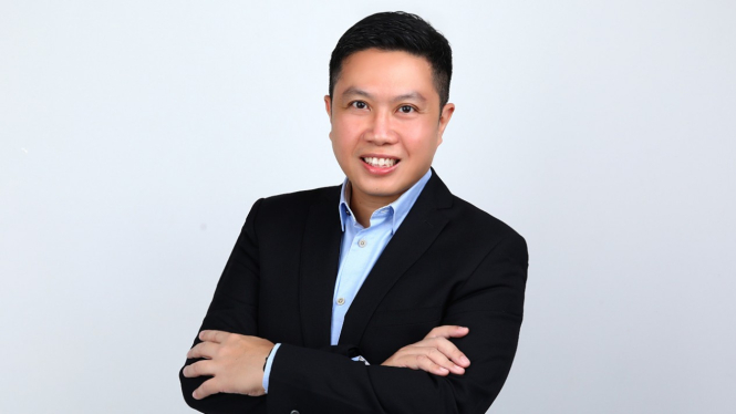 Direktur Pemasaran Telkomsel Derrick Heng.