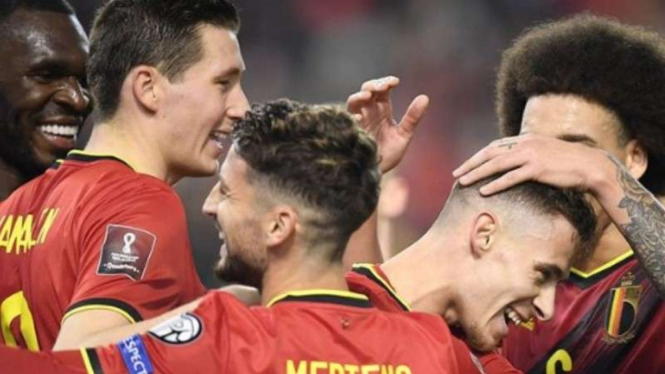 Pemain Belgia rayakan keberhasilan lolos ke Piala Dunia 2022.