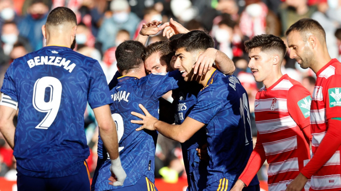 Real Madrid rayakan gol ke gawang Granada