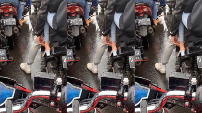 Viral Pria Ini Mengelus-elus Kaki Pasangannya di Atas Motor