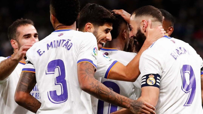 Pemain Real Madrid merayakan gol.