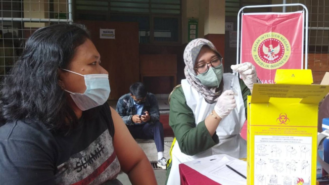 Vaksinasi yang digalang BIN di sejumlah wilayah Ibu Kota Jakarta.