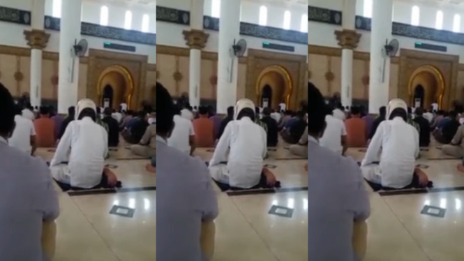 Viral Lagi Video Pria Salat Pakai Helm di Masjid