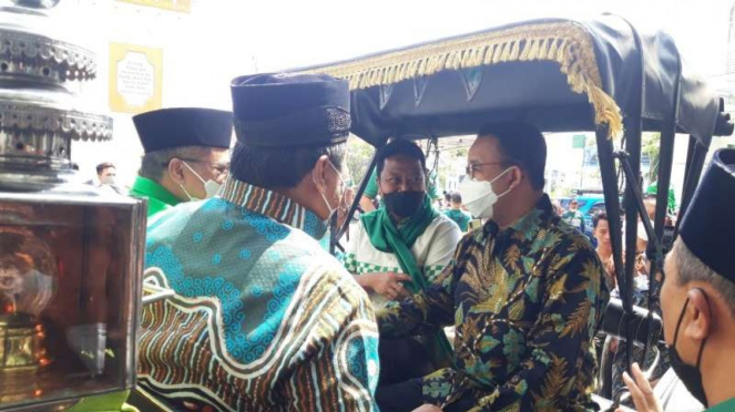 Anies Baswedan dan Romahurmuziy di kereta kuda di Yogyakarta
