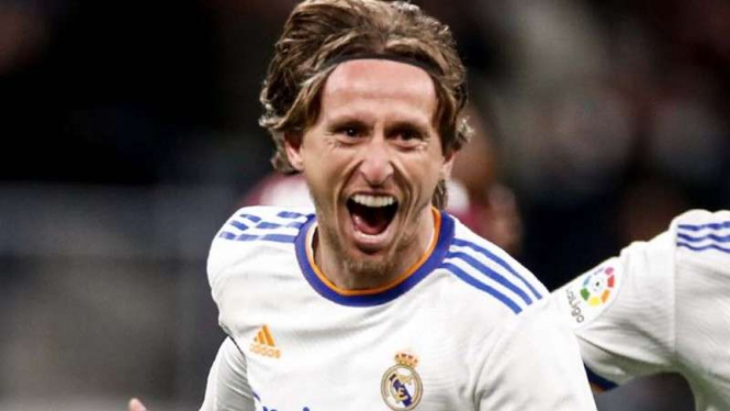 Gelandang Real Madrid, Luka Modric rayakan gol.