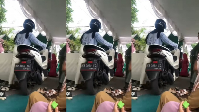 Viral Wanita Tuntun Motornya Lewat Tenda Hajatan 