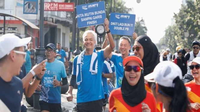 Gubernur Jawa Tengah Ganjar Pranowo dan istri saat ikut lomba marathon