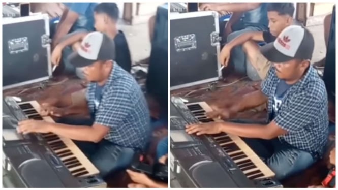 seorang pria memainkan keyboard seperti DJ