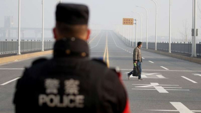 Ilustrasi aparat Kepolisian China