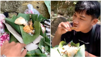Nekat, Pria Ini Lakukan &lsquo;Mukbang&rsquo; Sesajen Kuburan
