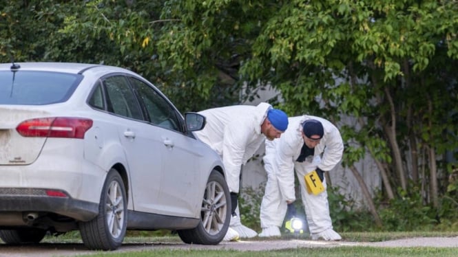 Polisi melakukan pemeriksaan TKP di provinsi Saskatchewan, Kanada.